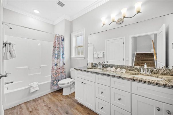 Bathroom, Dual Sink Vanities, Interior, Recessed Lighting, Wood Texture Flooring