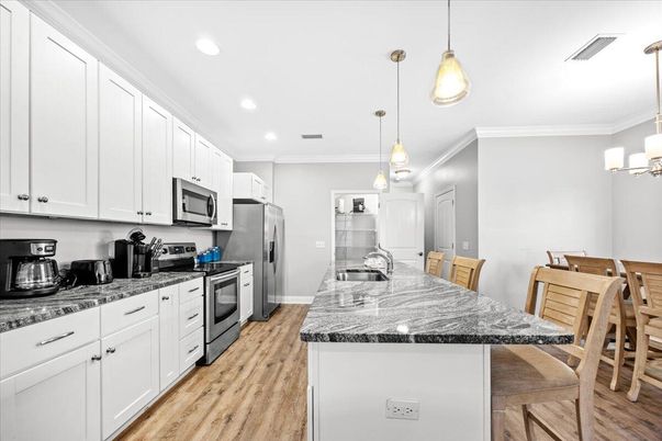 Interior, Kitchen, Pendant Lights, Recessed Lighting, Stainless Steel Appliances, Wood Texture Flooring