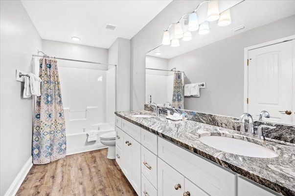 Bathroom, Dual Sink Vanities, Interior, Recessed Lighting, Wood Texture Flooring