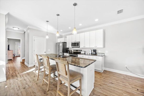 Interior, Kitchen, Pendant Lights, Recessed Lighting, Stainless Steel Appliances, Wood Texture Flooring