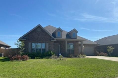 Attached, Backyard, Exterior, Facade, Brick Facade, American Craftsman