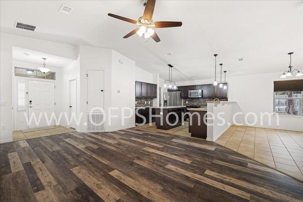 Chandelier, Empty room, Interior, Kitchen, Pendant Lights, Stainless Steel Appliances, Wood Texture Flooring