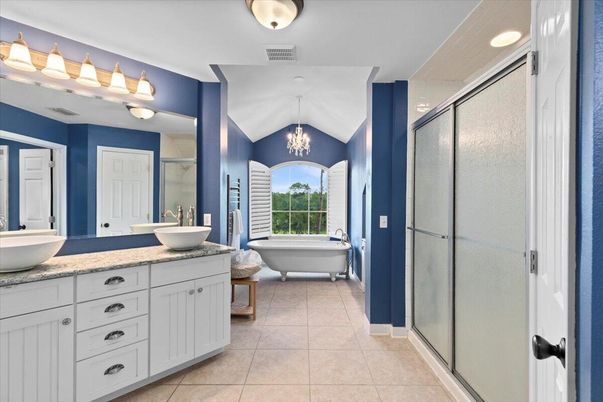Bathroom, Chandelier, Dual Sink Vanities, Free Standing Baths, Glass Shower, Interior
