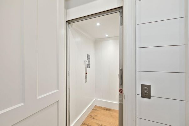 Elevator, Interior, Recessed Lighting, Wood Texture Flooring