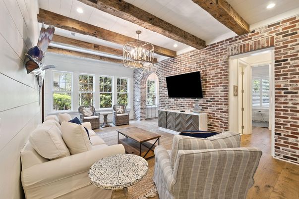 Chandelier, Fireplace, Interior, Living room, Recessed Lighting, Stone Walls, Wooden Beams, Wood Texture Flooring