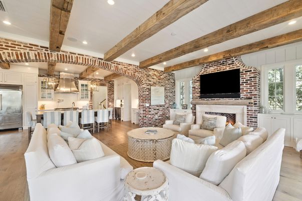Dining room, Fireplace, Interior, Kitchen, Living room, Pendant Lights, Recessed Lighting, Stainless Steel Appliances, Stone Walls, Wooden Beams, Wood Texture Flooring