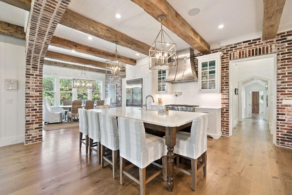 Dining room, Interior, Kitchen, Pendant Lights, Recessed Lighting, Stainless Steel Appliances, Stone Walls, Wooden Beams, Wood Texture Flooring