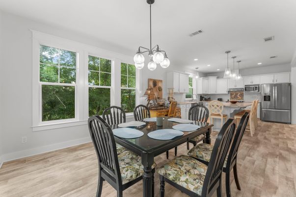 Dining room, Interior, Kitchen, Pendant Lights, Recessed Lighting, Stainless Steel Appliances, Wood Texture Flooring