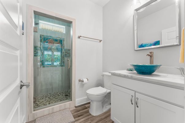 Bathroom, Glass Shower, Interior, Tile Countertops, Wood Texture Flooring