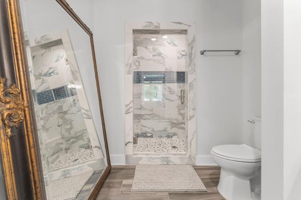 Bathroom, Glass Shower, Interior, Marble Walls, Wood Texture Flooring