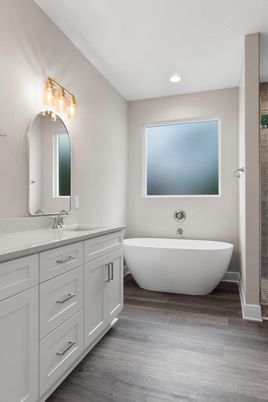 Bathroom, Dual Sink Vanities, Free Standing Baths, Interior, Recessed Lighting, Wood Texture Flooring