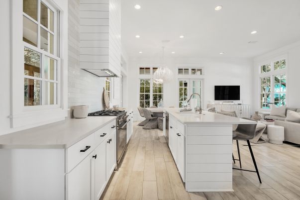 Chandelier, Interior, Kitchen, Living room, Pendant Lights, Recessed Lighting, Stainless Steel Appliances, Wood Texture Flooring