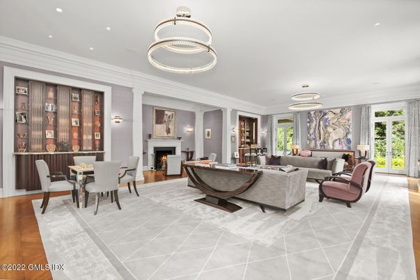 Dining room, Fireplace, Interior, Living room, Pendant Lights, Recessed Lighting, Wood Texture Flooring