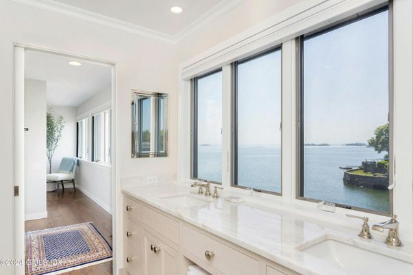 Bathroom, Dual Sink Vanities, Interior, Recessed Lighting, Water, Wood Texture Flooring