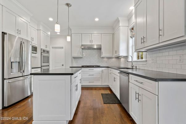 Interior, Kitchen, Pendant Lights, Recessed Lighting, Stainless Steel Appliances, Wood Texture Flooring
