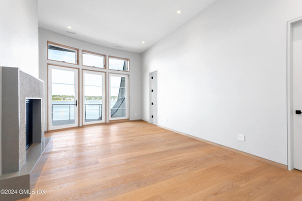 Empty room, Fireplace, Interior, Recessed Lighting, Wood Texture Flooring