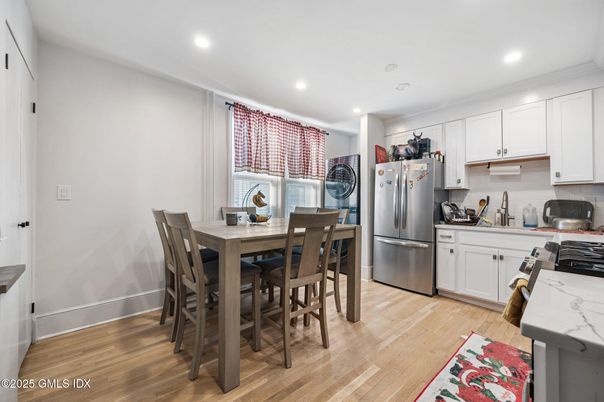 Dining room, Interior, Kitchen, Recessed Lighting, Stainless Steel Appliances, Wood Texture Flooring