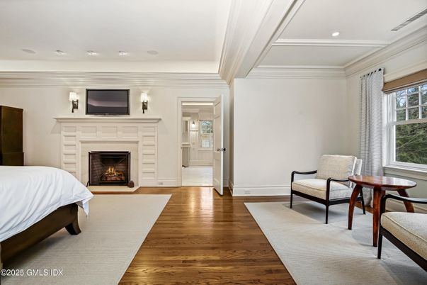 Bedroom, Fireplace, Interior, Recessed Lighting, Wood Texture Flooring