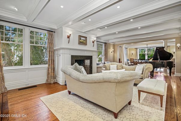 Fireplace, Interior, Living room, Piano, Recessed Lighting, Wood Texture Flooring