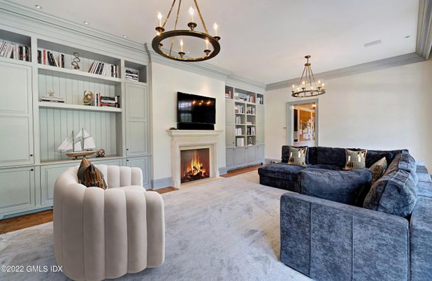 Chandelier, Fireplace, Interior, Living room, Pendant Lights, Recessed Lighting, Wood Texture Flooring
