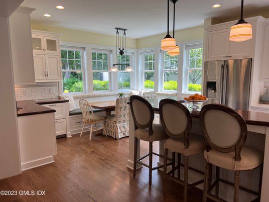 Dining room, Interior, Kitchen, Pendant Lights, Recessed Lighting, Stainless Steel Appliances, Wood Texture Flooring