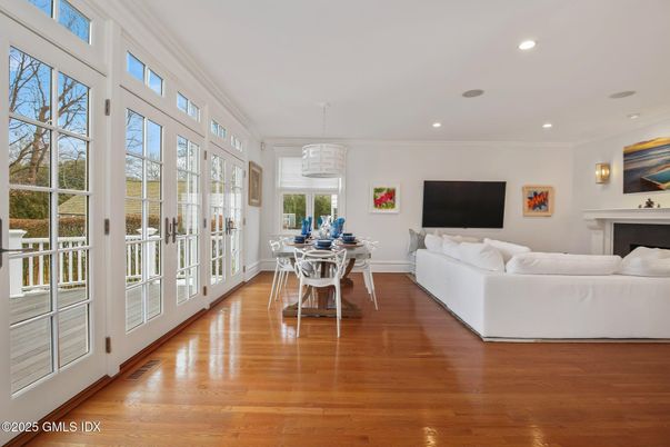 Dining room, Fireplace, Interior, Living room, Pendant Lights, Recessed Lighting, Wood Texture Flooring