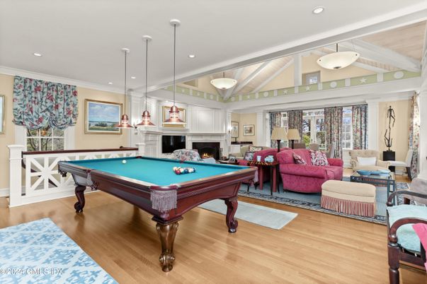 Billiard Table, Fireplace, Game Room, Interior, Living room, Pendant Lights, Recessed Lighting, Wood Texture Flooring