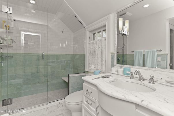 Bathroom, Dual Sink Vanities, Glass Shower, Interior, Marble, Recessed Lighting