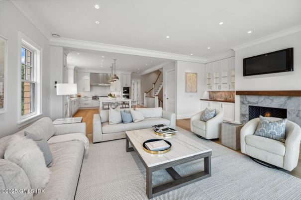Fireplace, Interior, Kitchen, Living room, Pendant Lights, Recessed Lighting, Stainless Steel Appliances, Wood Texture Flooring