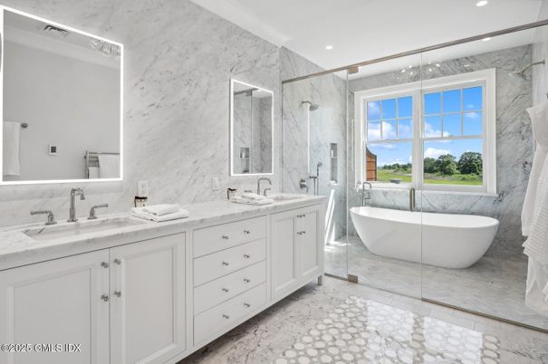 Bathroom, Dual Sink Vanities, Free Standing Baths, Glass Shower, Interior, Marble, Marble Walls, Recessed Lighting