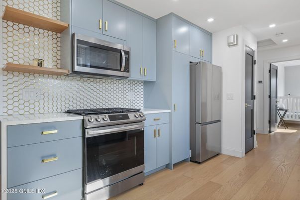Interior, Kitchen, Recessed Lighting, Stainless Steel Appliances, Wood Texture Flooring