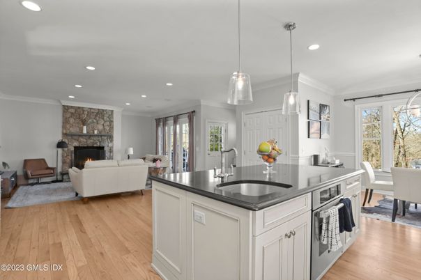 Dining room, Fireplace, Interior, Kitchen, Living room, Pendant Lights, Recessed Lighting, Wood Texture Flooring