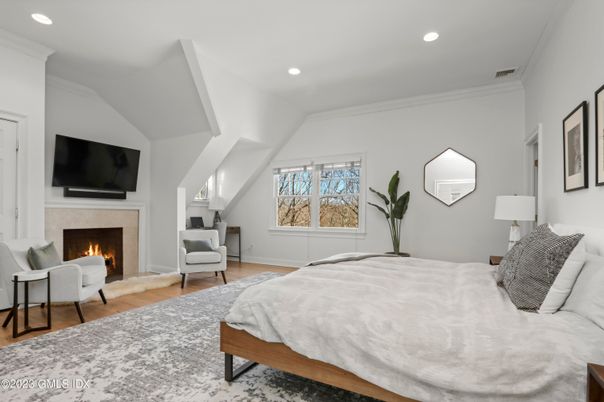 Bedroom, Fireplace, Interior, Recessed Lighting, Wood Texture Flooring