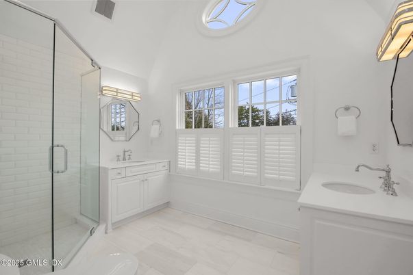 Bathroom, Dual Sink Vanities, Glass Shower, Interior, Wood Texture Flooring