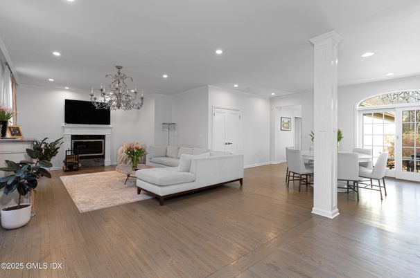 Chandelier, Dining room, Fireplace, Interior, Living room, Recessed Lighting, Wood Texture Flooring