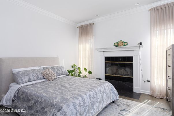 Bedroom, Fireplace, Interior, Recessed Lighting, Wood Texture Flooring