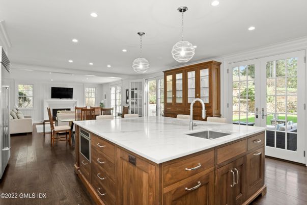 Dining room, Fireplace, Interior, Kitchen, Living room, Pendant Lights, Recessed Lighting, Stainless Steel Appliances, Wood Texture Flooring