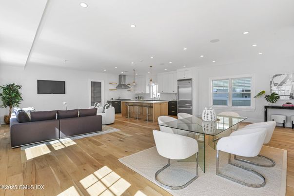 Dining room, Interior, Kitchen, Living room, Pendant Lights, Recessed Lighting, Stainless Steel Appliances, Wood Texture Flooring