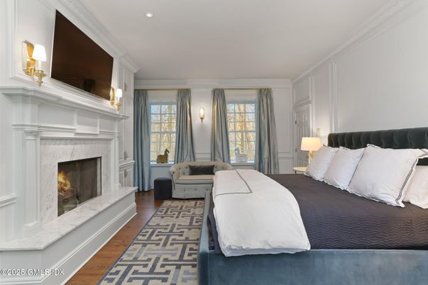 Bedroom, Fireplace, Interior, Recessed Lighting, Wood Texture Flooring