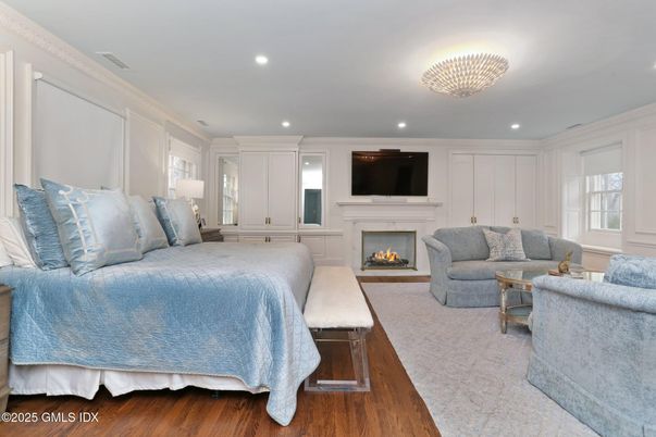 Bedroom, Fireplace, Interior, Living room, Recessed Lighting, Wood Texture Flooring