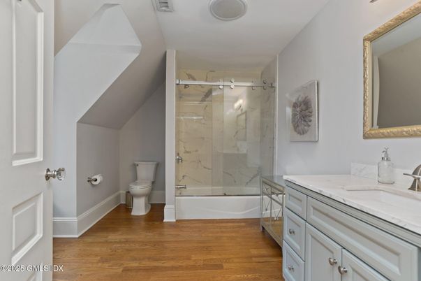 Bathroom, Glass Shower, Interior, Marble Walls, Wood Texture Flooring