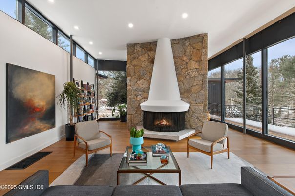 Fireplace, Interior, Living room, Recessed Lighting, Stone Walls, Wood Texture Flooring