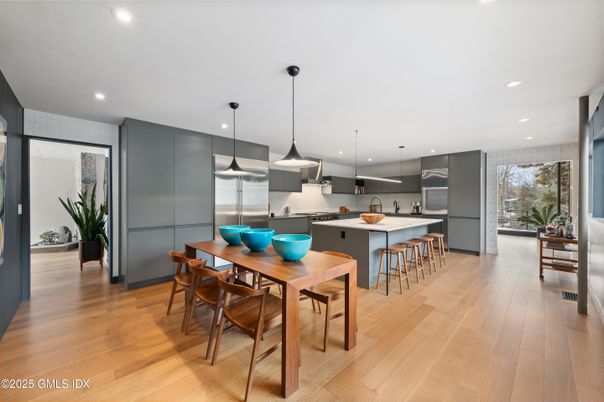 Dining room, Interior, Kitchen, Pendant Lights, Recessed Lighting, Stainless Steel Appliances, Wood Texture Flooring