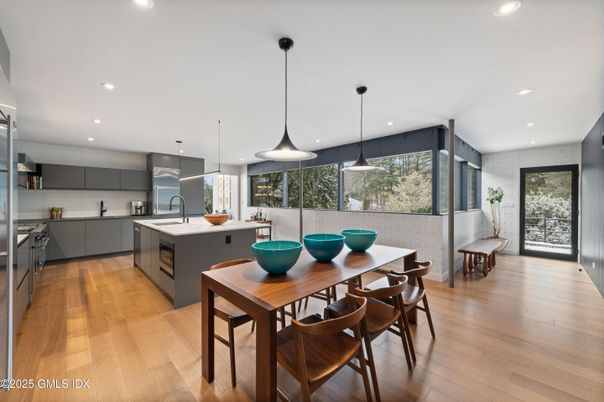 Dining room, Interior, Kitchen, Pendant Lights, Recessed Lighting, Stainless Steel Appliances, Wood Texture Flooring