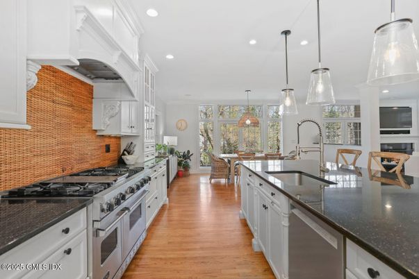 Dining room, Interior, Kitchen, Pendant Lights, Recessed Lighting, Stainless Steel Appliances, Wood Texture Flooring