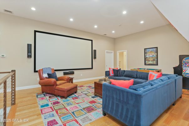 Interior, Living room, Projection Screen, Recessed Lighting, Wood Texture Flooring