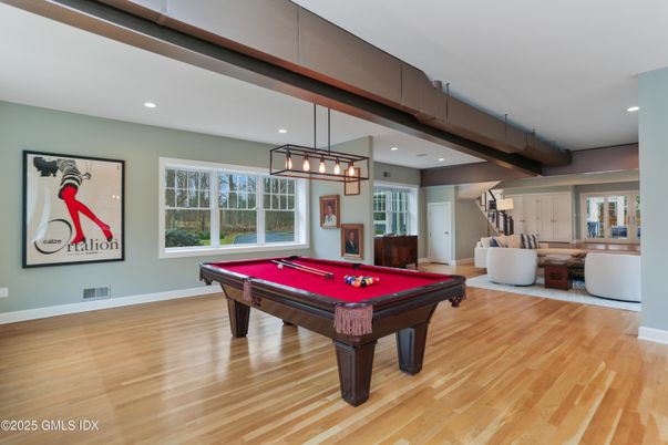 Billiard Table, Chandelier, Game Room, Interior, Pendant Lights, Recessed Lighting, Wood Texture Flooring