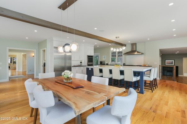 Dining room, Interior, Kitchen, Pendant Lights, Recessed Lighting, Stainless Steel Appliances, Wood Texture Flooring