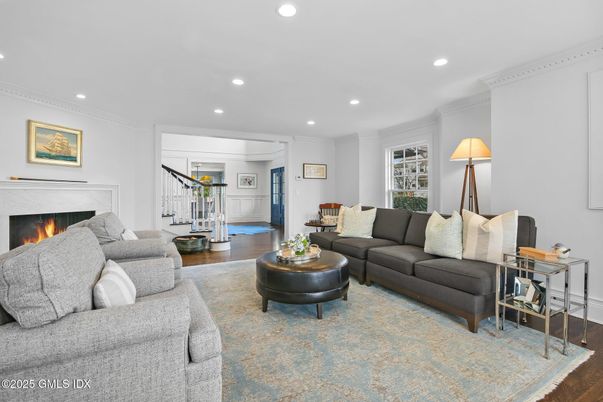 Fireplace, Fitness Equipment, Interior, Living room, Recessed Lighting, Wood Texture Flooring
