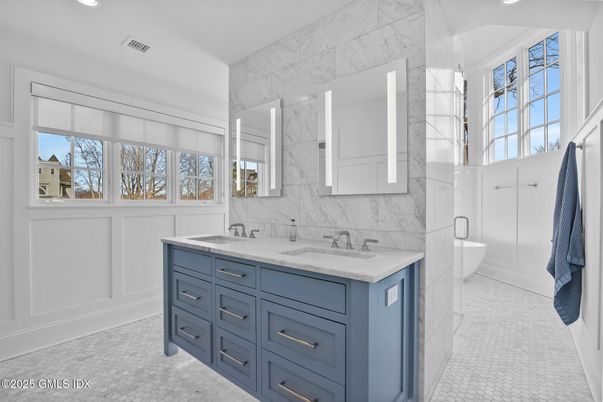 Bathroom, Dual Sink Vanities, Interior, Marble Walls, Recessed Lighting